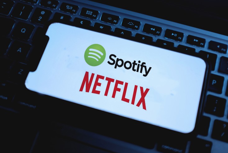 Earnings spotlight: Spotify, IPG and Netflix